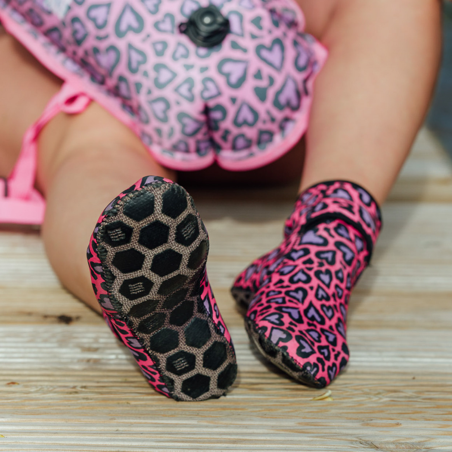 Pink and black patterned neoprene shoes